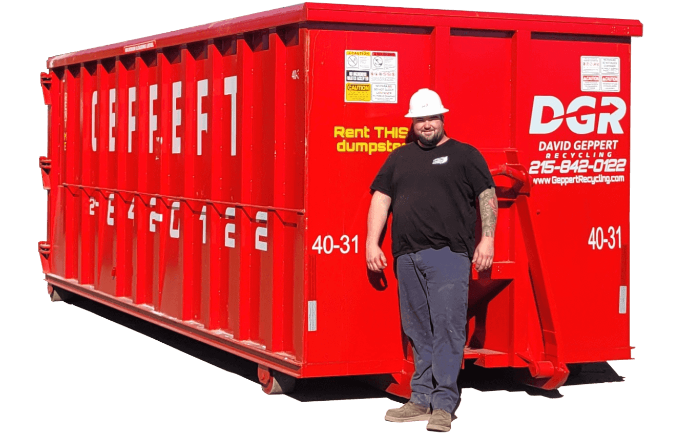 Truck unloading a dumpster
