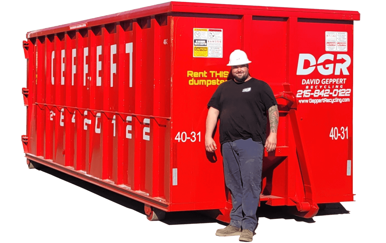 Truck unloading a dumpster