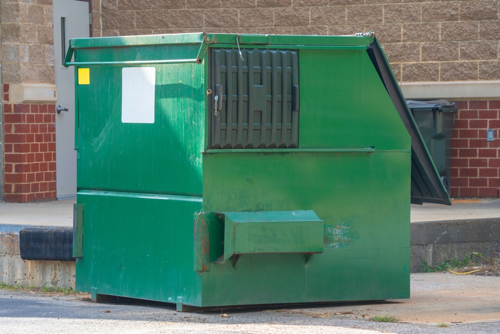 Is It Illegal to Throw Trash in a Commercial Dumpster?